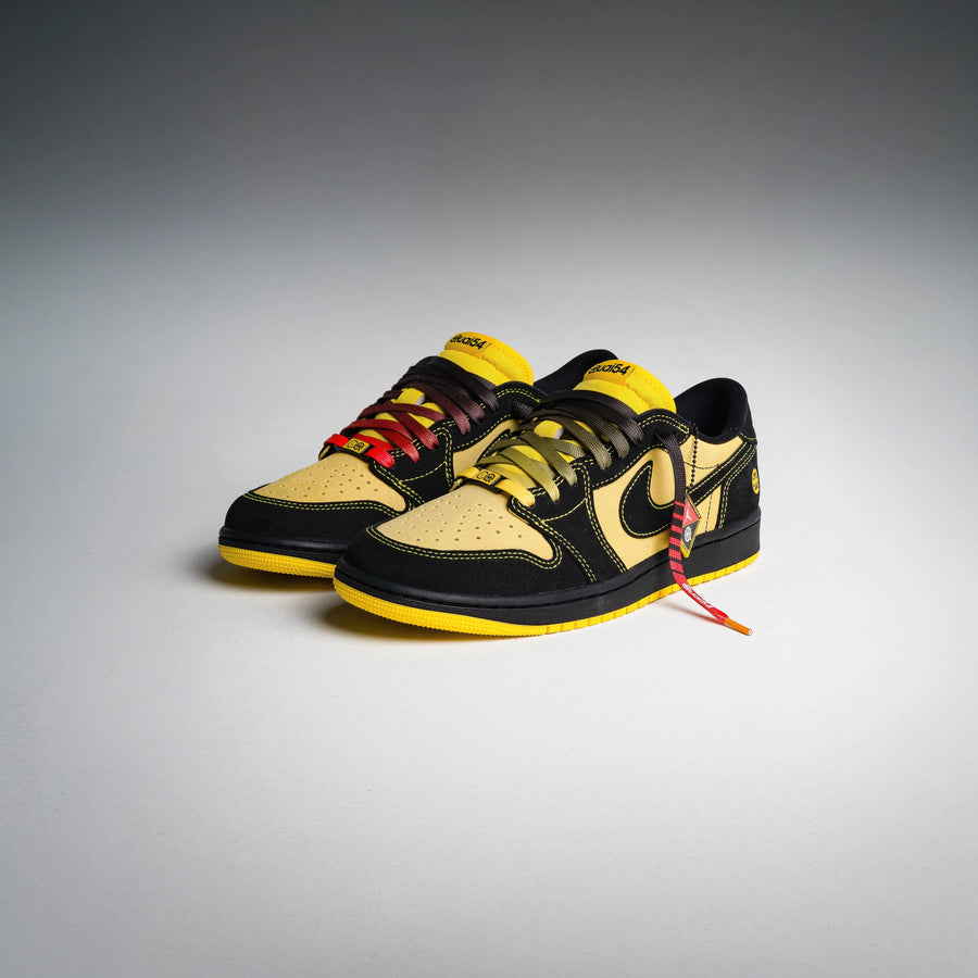 Lacets Pop's Quai 54 sur une paire jaune et noire